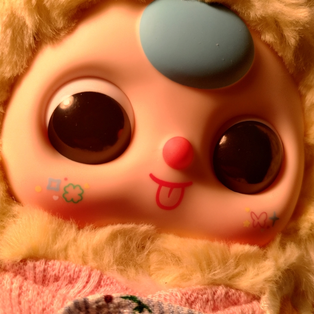 Adorable Plush Doll with Blue and Pink Accents